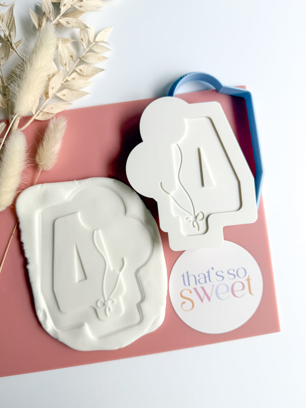 Number Four with Balloon Strings