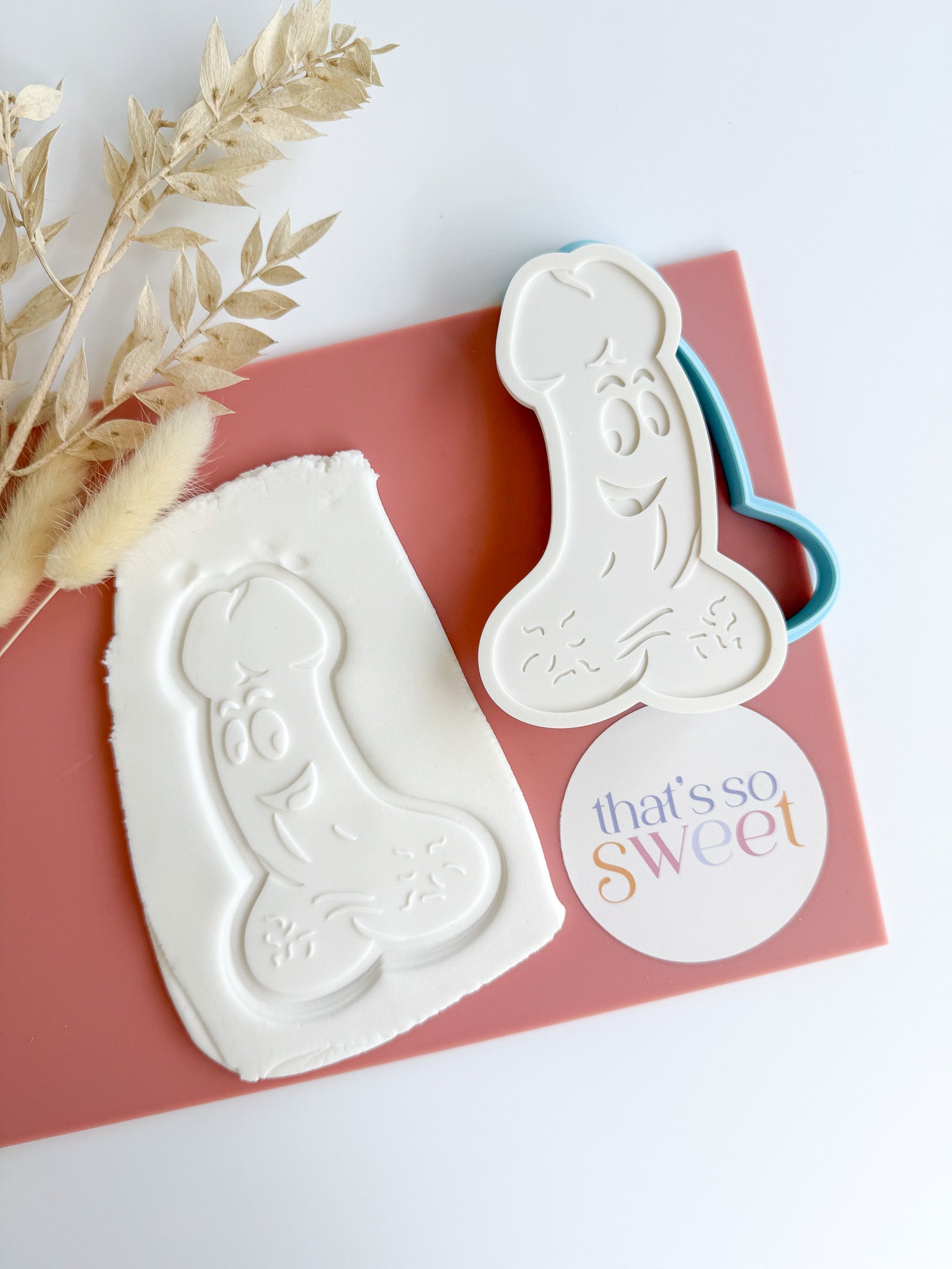 Penis with Face Stamp and Cutter